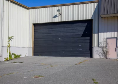 An outside view of Stonewall Garage’s unique ‘Holding Tank' After Hours pick-up/drop-off Car storage facility in Enfield Connecticut